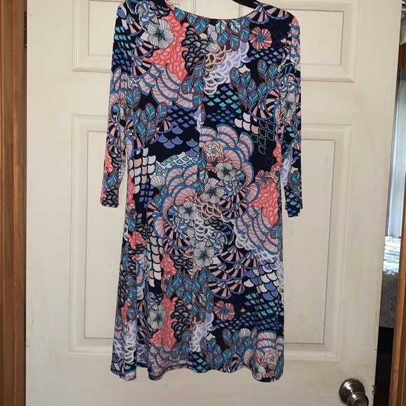This multi print dress is made from 96% polyester and 4% spandex, super comfy! - Picture 3 of 3